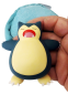 Preview: Pokémon Schlaf Figur Snorlax im Set mit Sammelbox
