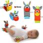 Preview: Baby Aktiv Spiel Armband Giraffe oder Zebra mit Rassel von Sozzy